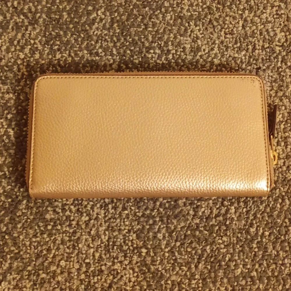 Coach gold pebbled leather accordion wallet